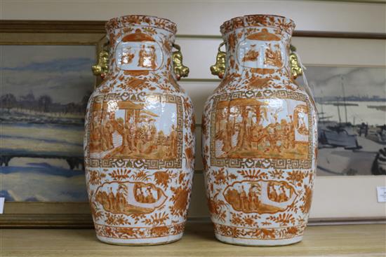 A pair of Chinese iron red and gilt porcelain vases, 19th century mounted as lamps